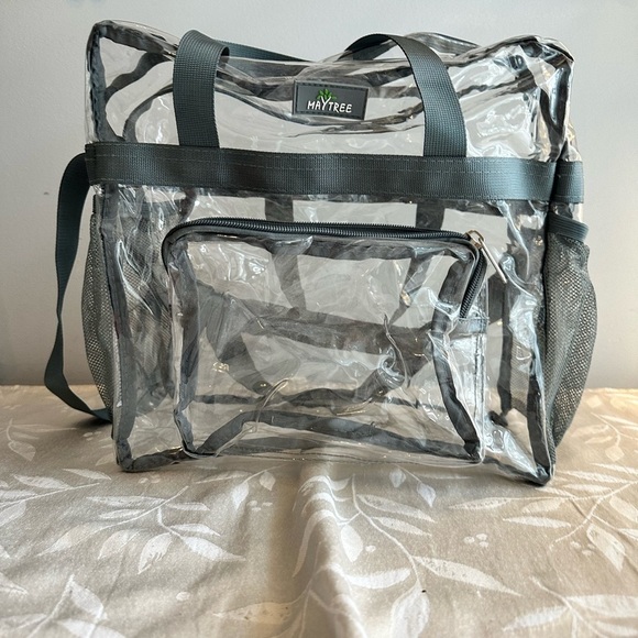 Clear bag. Perfect for concerts or baby bag. Side mesh holders and long strap. - Picture 4 of 7